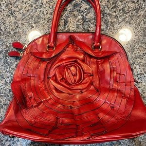 Valentino Garabani red rose petal leather detail